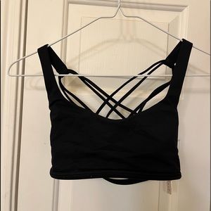 black lululemon sports bra with crossing straps on back (NO PADDING)